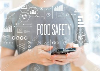 Food safety with young man using a smartphone