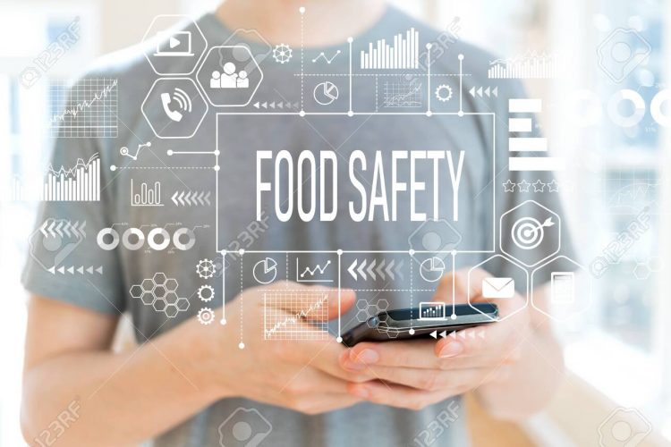 Food safety with young man using a smartphone