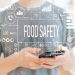 Food safety with young man using a smartphone